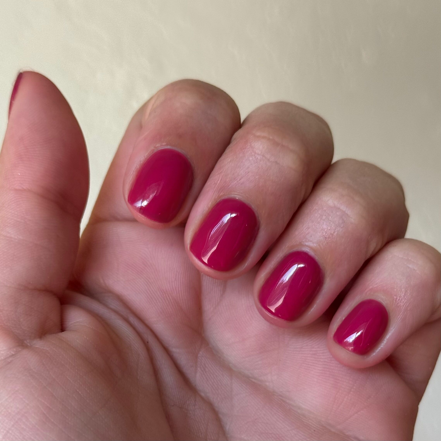 JG - Gel on short rounded nails in a rich berry shade for a smooth, long-lasting gel polish mani by Olive and June