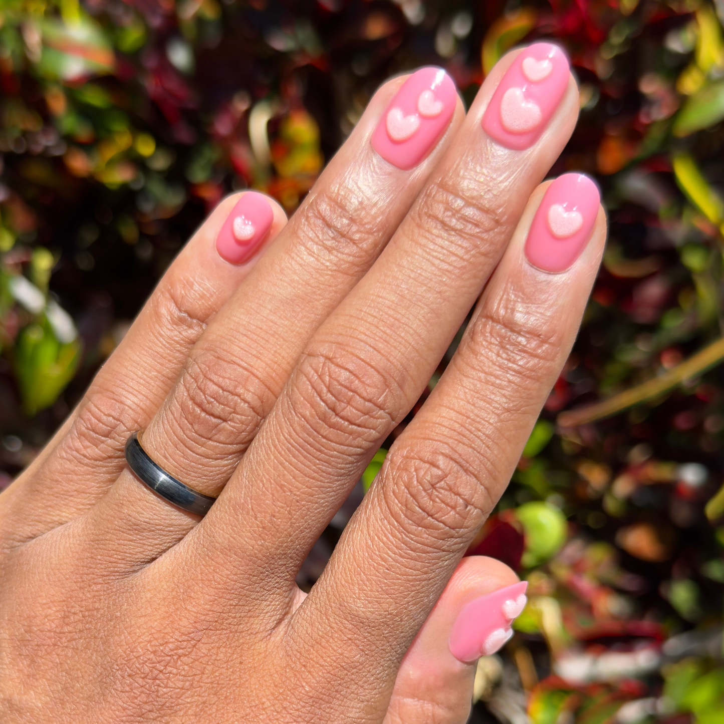 3D Crystal Hearts - Press-On | Extra Short | Round baby pink nails with raised jumbo 3D hearts for easy at-home mani
