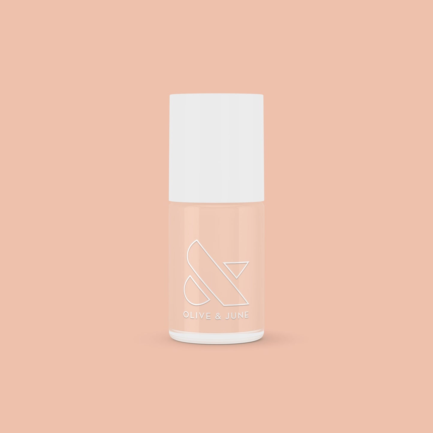 KAG nail polish bottle in neutral peachy pink shade on matching peach background for a fresh mani or pedi