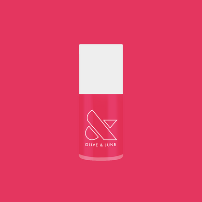 Diner Date bright hot pink nail polish bottle on matching background for a vibrant at-home manicure option