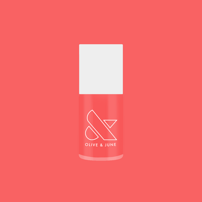 Perfect Pinwheel coral gel polish bottle by Olive and June for long-lasting at home manicures with a vibrant finish