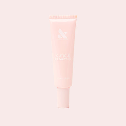 Soft pink tube of Cuticle Remover for gentle exfoliation and safe at home manicure and pedicure prep