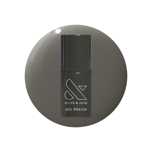 Is It Smoky In Here? Gel polish bottle with deep charcoal gray for a sleek, long-lasting mani by Olive and June
