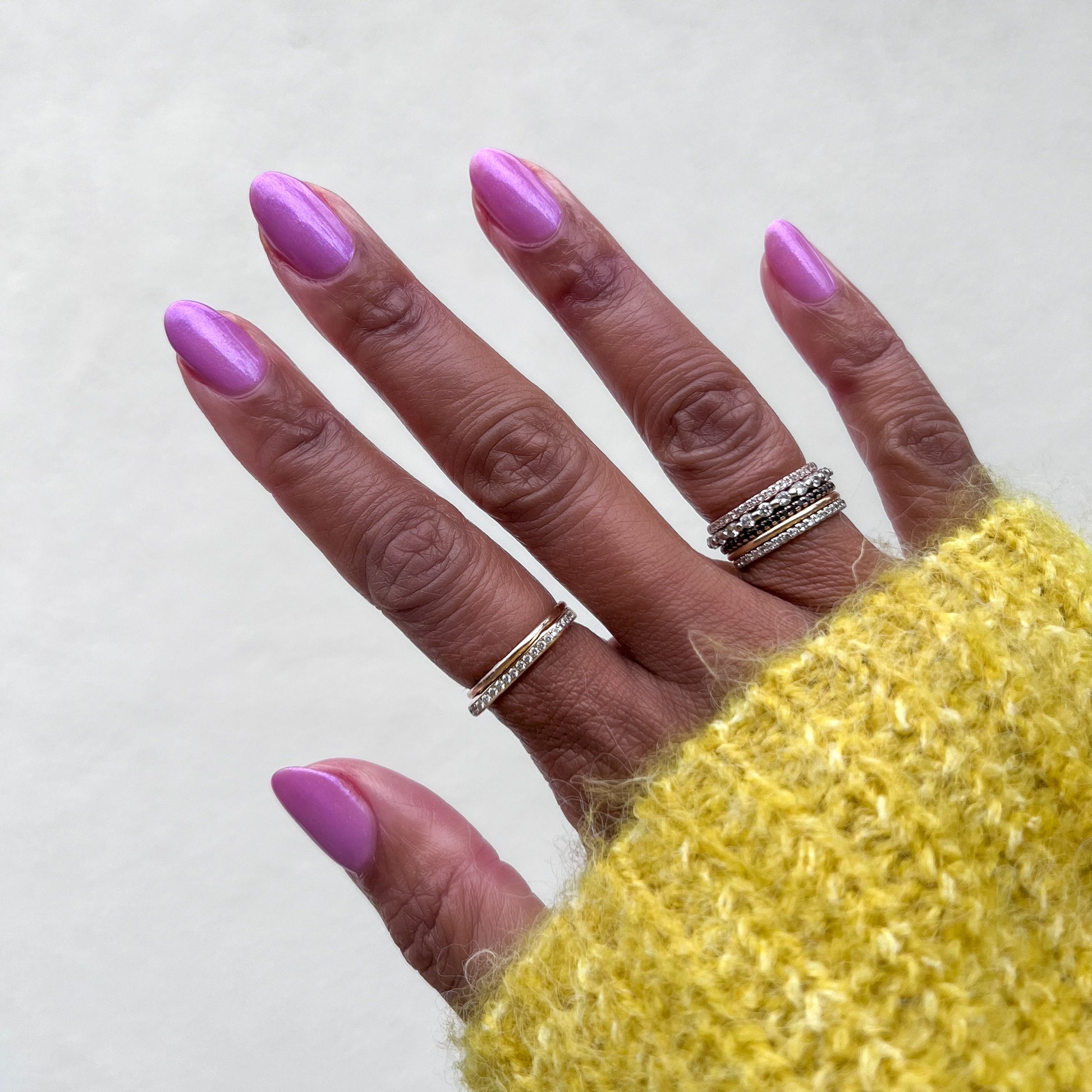 Island Time gel polish on natural nails in a subtle lilac shimmer for a smooth, long-lasting at-home manicure by Olive and June
