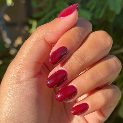 Mulberry - Gel on natural nails in a deep maroon shade with a glossy, long-lasting manicure by Olive and June