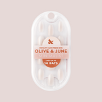 Pure White Syrup Gradient - Press-On | Medium | Oval showing packaged medium oval white gradient press-on false nails by Olive & June