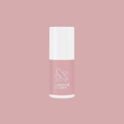 Puffball quick dry gel polish bottle in soft milky pink shade on muted pink background