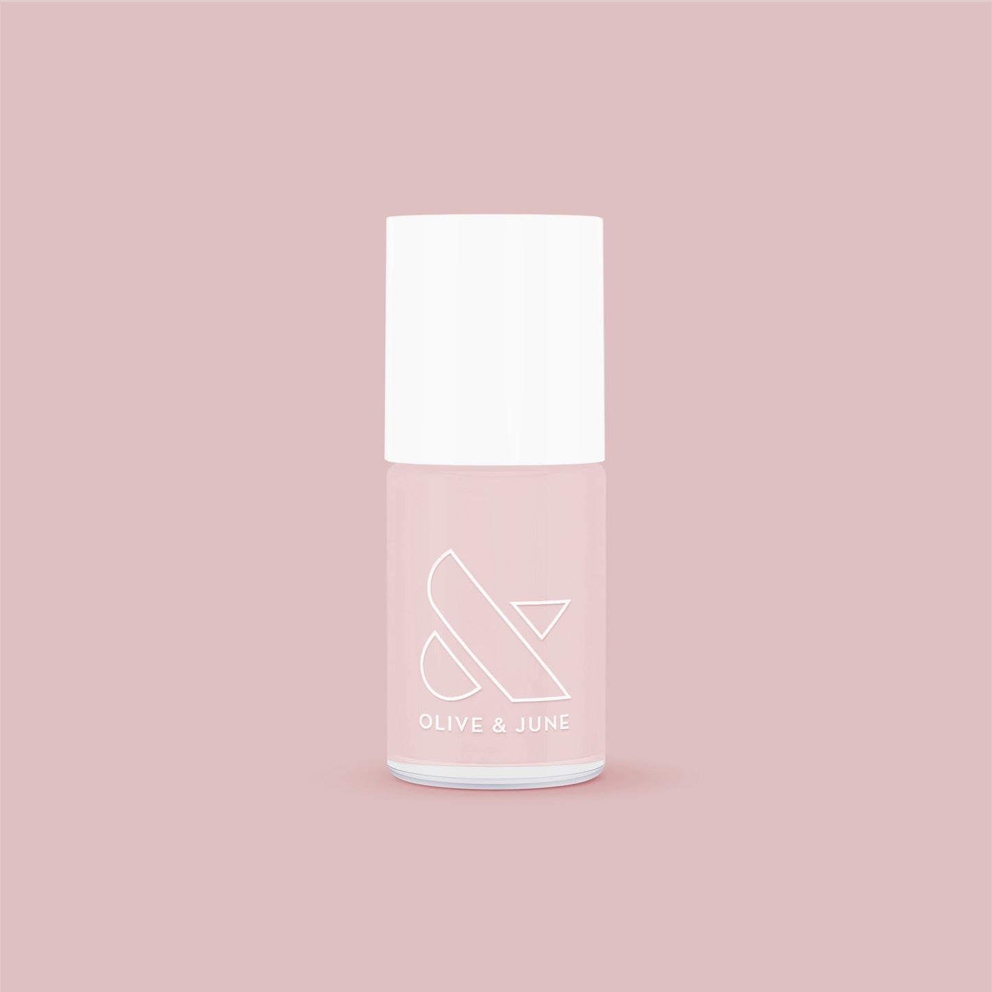 Olive and June nail polish bottle in soft neutral mauve shade The Queen Takes her Tea with Milk for elegant mani at home