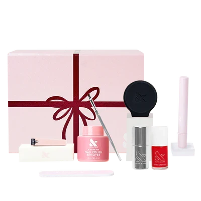 The Mani System nail care kit with polish remover, nail polish, tools, and luxury pink gift box for at-home manicures