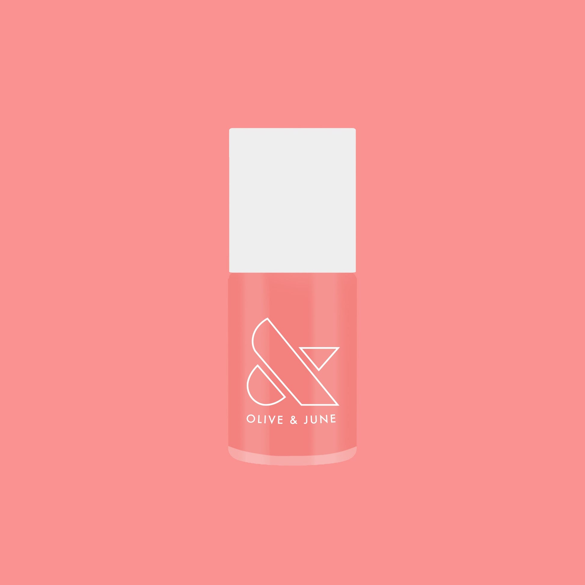 Bottle of Carrot Juice gel polish by Olive and June in a vibrant carrot orange shade on coral background